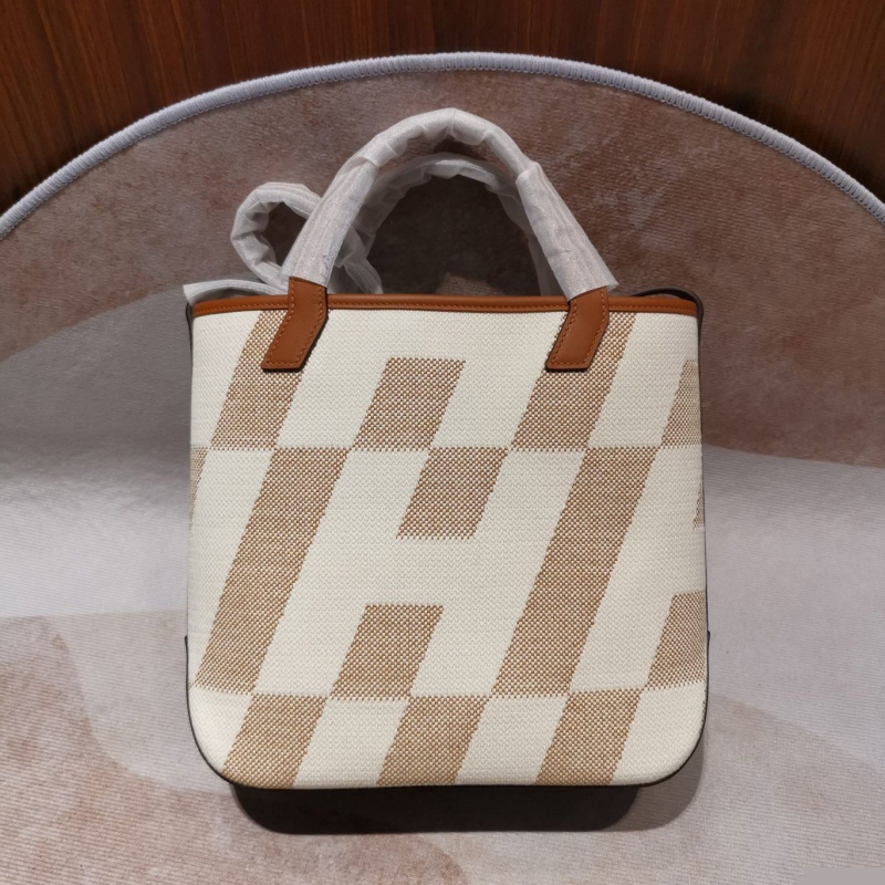 H**mes shopping bags